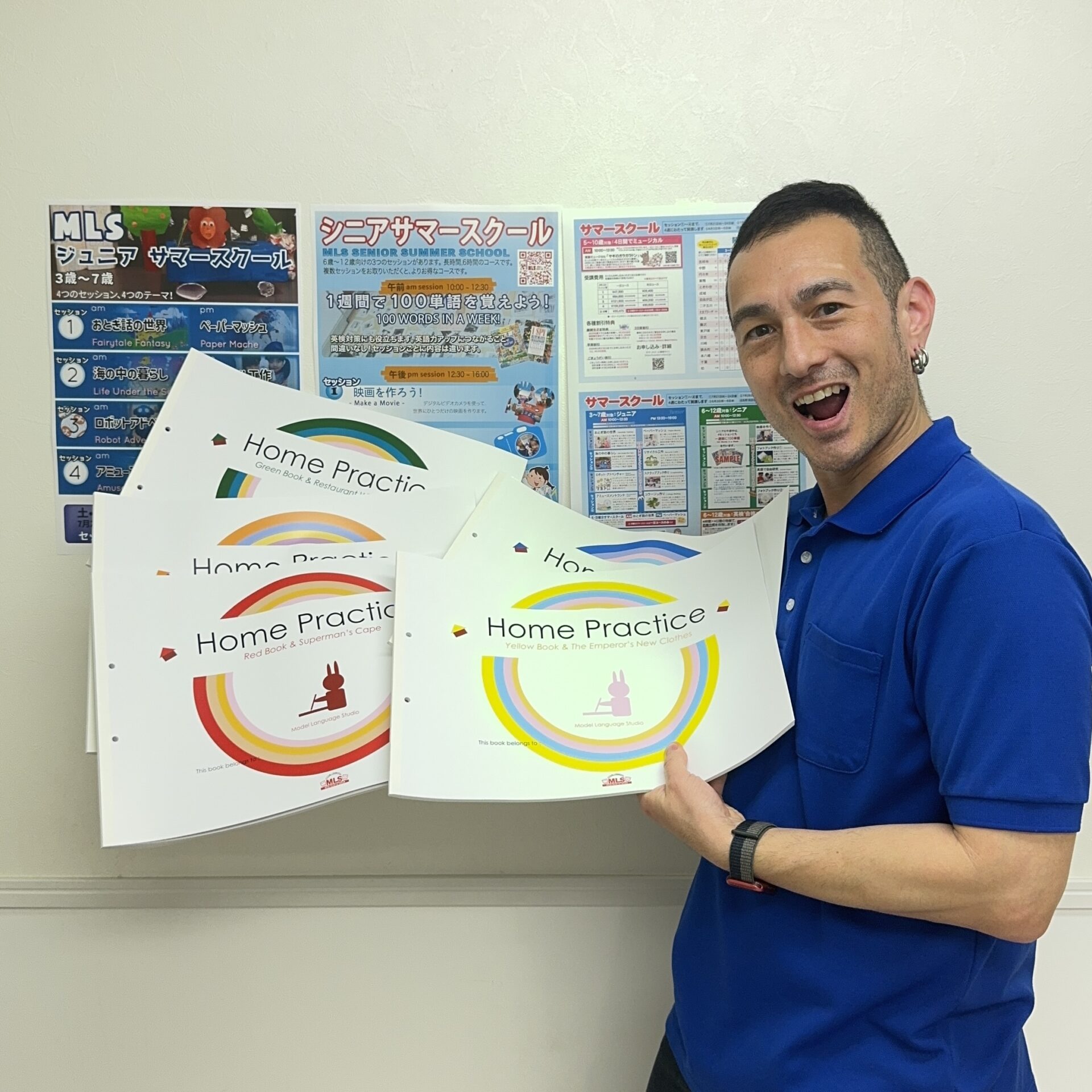 Teacher showcasing Home Practice English textbooks with a smile
